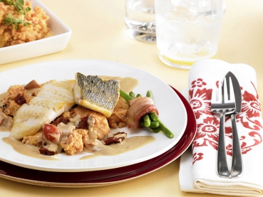 Gebratenes Fischfilet auf Polenta