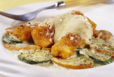 Gratinierte Fischstäbchen auf Gemüse