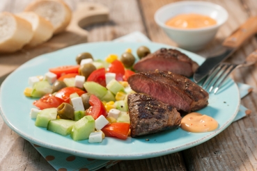 Lammlachse mit buntem Salat