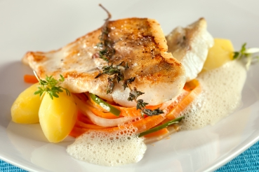 Pangasius mit glasiertem Gemüse