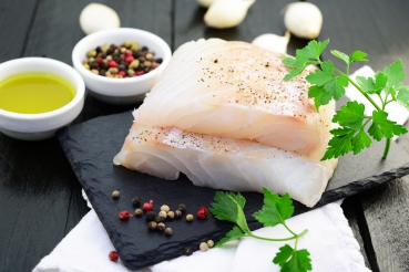 Gefüllte Fischroulade in Senf-Dillsoße und Petersilienreis