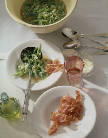 Reissuppe mit frischen Erbsen